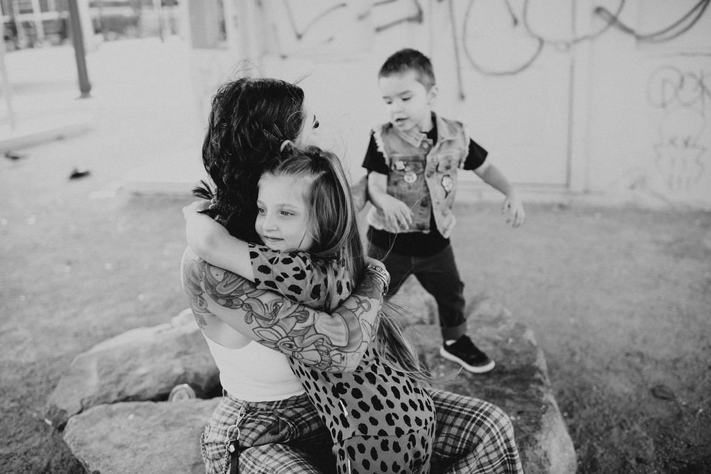 Family portrait session in Downtown Las Vegas. Captured by Brittany Lo Photo.