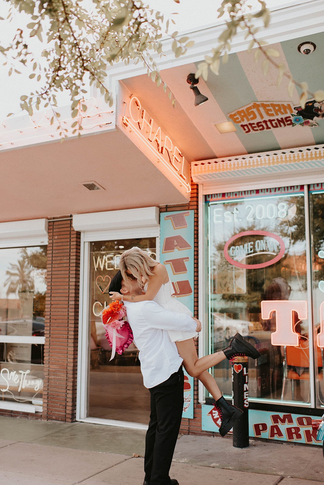 Megan & Lewis Downtown Surething Chapel Tattoo shop neon lights classic car rental