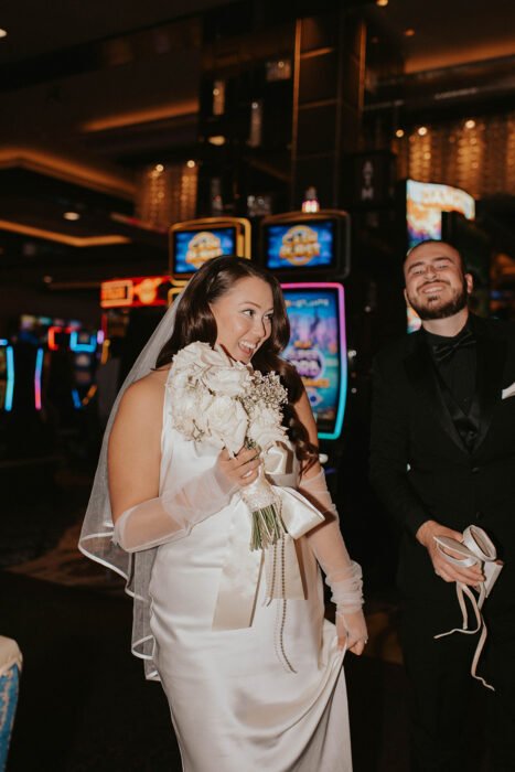 Missy & Zach’s Las Vegas strip elopement at Sure Thing Chapel, Little White Chapel, Neon Museum, and Cosmo Hotel. Captured by Brittany Lo Photo.