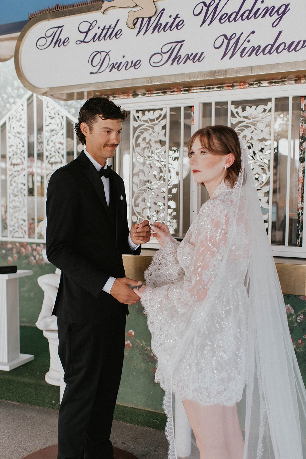 kelsey ethan downtown las vegas a little white chapel elopement plaza hotel neon lights