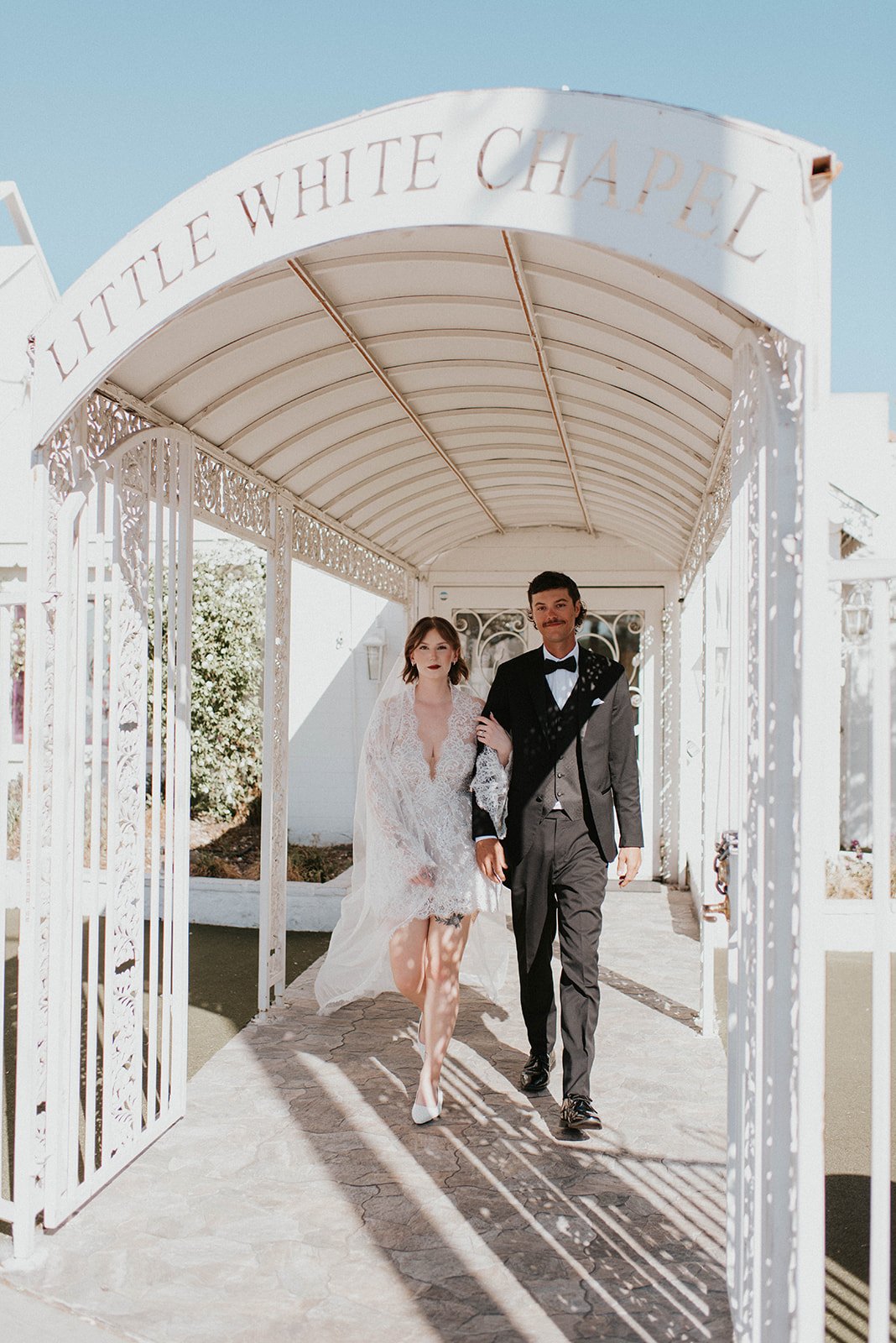 kelsey ethan downtown las vegas a little white chapel elopement plaza hotel neon lights