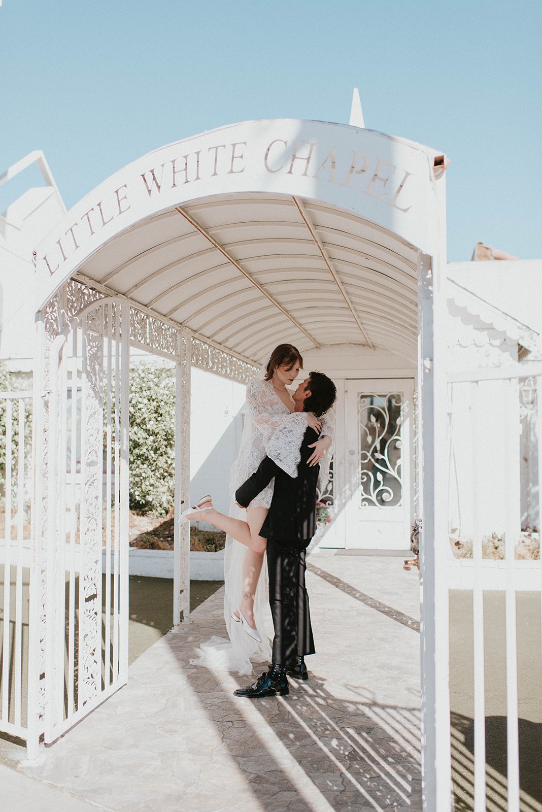 kelsey ethan downtown las vegas a little white chapel elopement plaza hotel neon lights