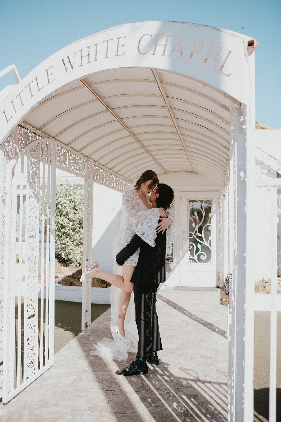 kelsey ethan downtown las vegas a little white chapel elopement plaza hotel neon lights