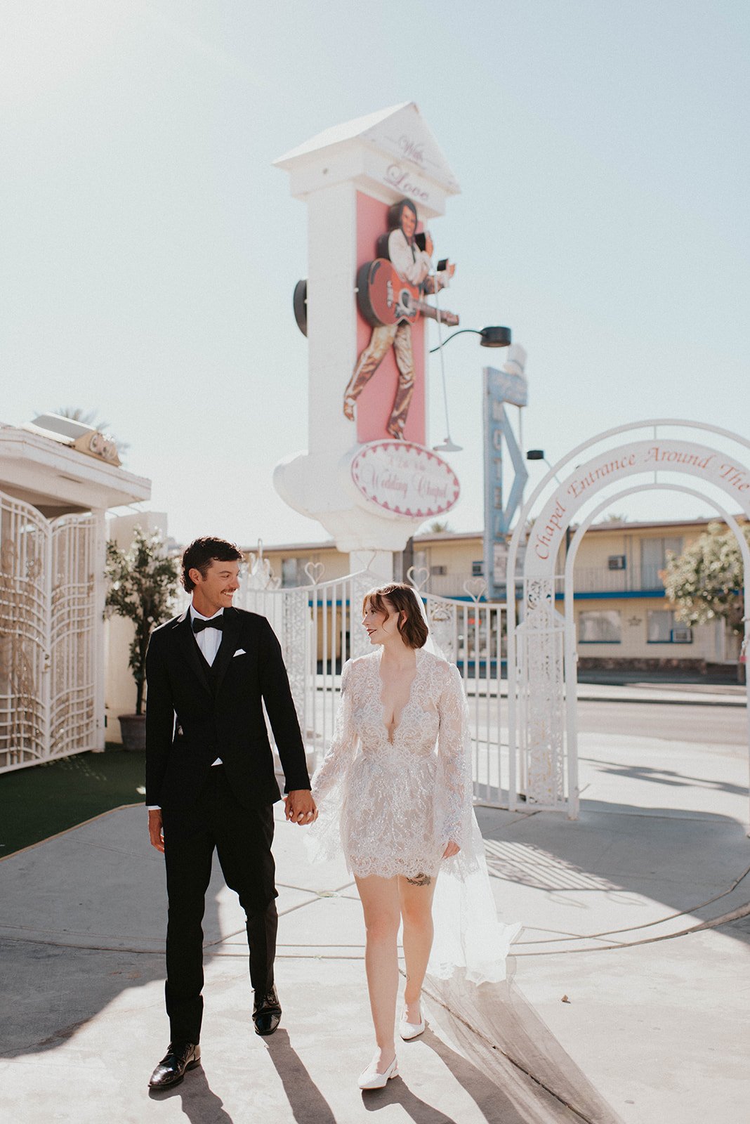 kelsey ethan downtown las vegas a little white chapel elopement plaza hotel neon lights