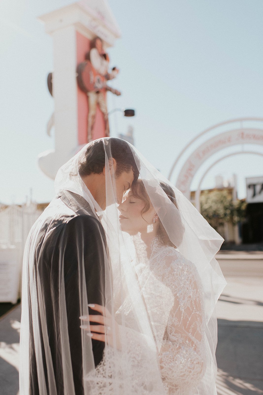kelsey ethan downtown las vegas a little white chapel elopement plaza hotel neon lights