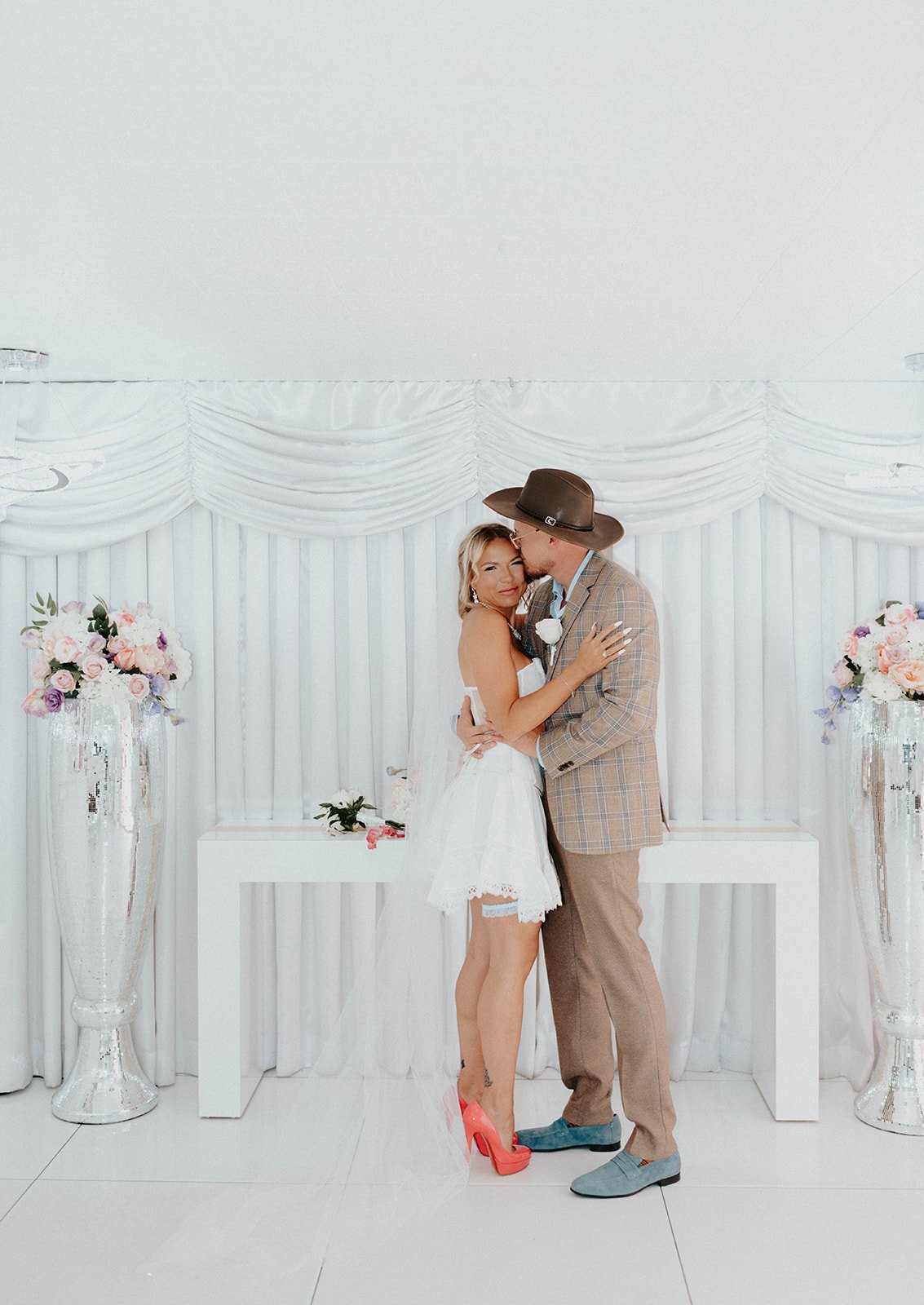 karolina max downtown las vegas a little white chapel elopement ending at plaza hotel neon lights